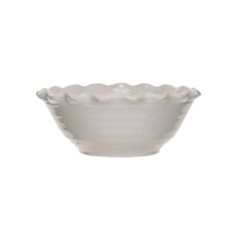 Add a touch of whimsy to your dining experience with this stoneware scalloped edge bowl in white. The scalloped edge adds a playful twist to any meal. Made from durable stoneware, this bowl is both functional and charming. 10" Round x 4"H