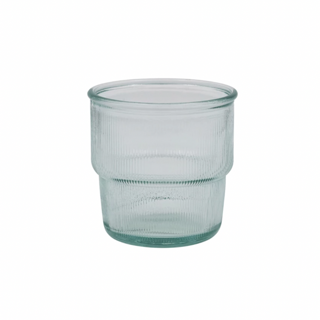 Sipping in style and sustainability with our Fluted Recycled Stackable Drinking Glass! Made from repurposed materials, this quirky glass features a unique embossed design and is stackable for easy storage. Cheers to saving the planet and having fun doing it! 3-1/2" Round x 3-1/2"H. 10 oz