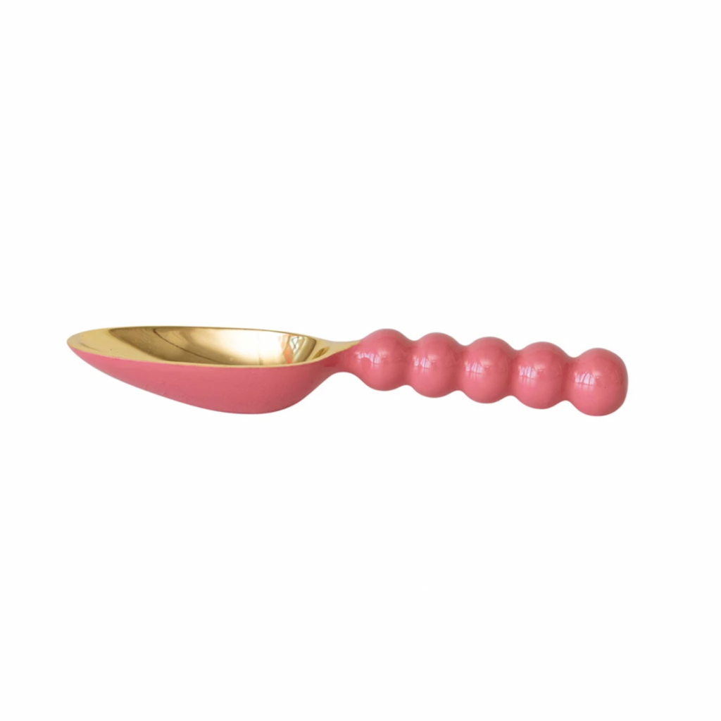 This enameled aluminum scoop is a cute and stylish piece that will add some flair and color to the kitchen. This scoop has a pink color and a gold finish, creating a contrast and a harmony between the metal and the enamel. It has a curved handle and a round bowl, which are smooth and comfortable to hold and use. Use it to scoop ice cream, candy, nuts, or popcorn, or as a decorative item or a gift. 9-1/2"L