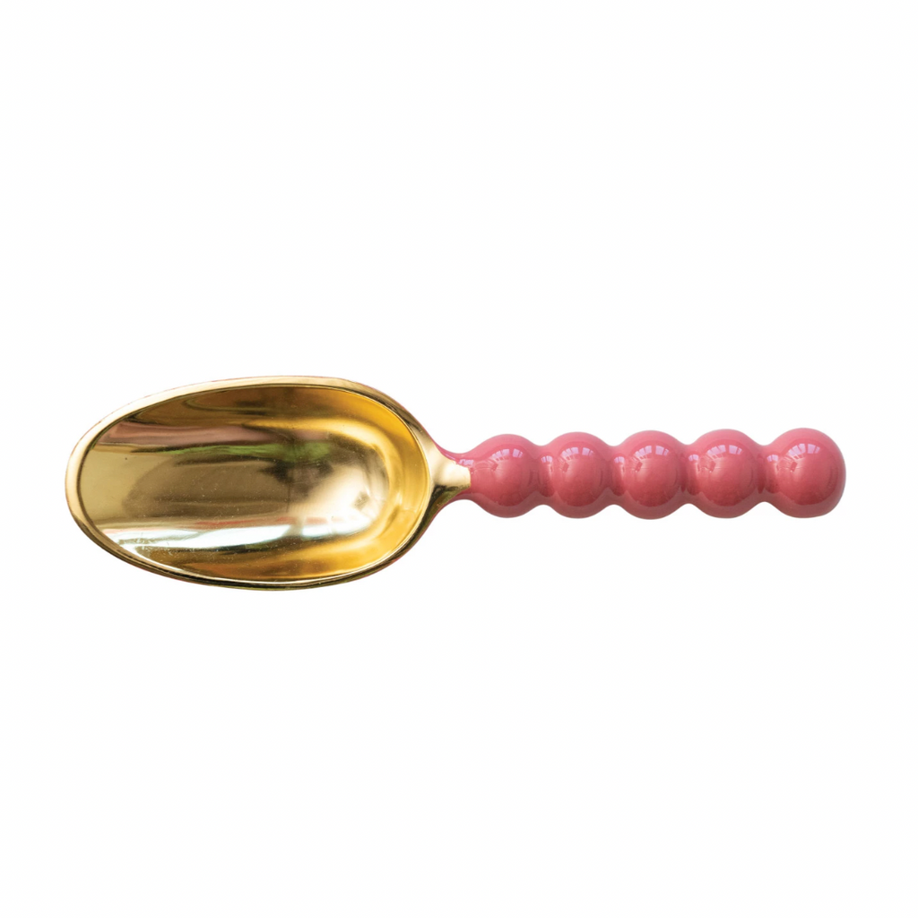 This enameled aluminum scoop is a cute and stylish piece that will add some flair and color to the kitchen. This scoop has a pink color and a gold finish, creating a contrast and a harmony between the metal and the enamel. It has a curved handle and a round bowl, which are smooth and comfortable to hold and use. Use it to scoop ice cream, candy, nuts, or popcorn, or as a decorative item or a gift. 9-1/2"L