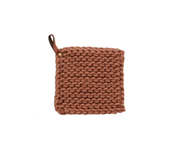 This square cotton crocheted pot holder with a leather loop is a cozy and rustic addition to the home or office kitchen. It features a square shape and a cotton crocheted design providing protection from hot pots and pans. The holder's leather loop allows easy storage and access. Made of high-quality cotton, it is soft, durable, and machine-washable. Measuring 8