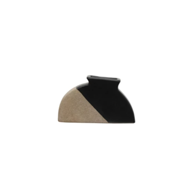 This artfully designed terra-cotta vase is alluring and uniquely shaped. With an accent of black that will be wonderful for any living room, dining room, kitchen, bedroom, or office and will complement a modern or eclectic vibe.