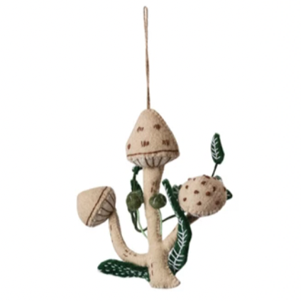 This handmade wool felt mushroom ornament set features three adorable and magical mushroom designs, each with their own applique and embroidery in multicolor and different styles. The ornaments are made of natural and organic wool, polyfill, jute, and have cute applique and embroidery that add detail and personality. Hang them on the tree, wreath, garland, or wall, or display them on a shelf or table, for a fairy or woodland themed decor.