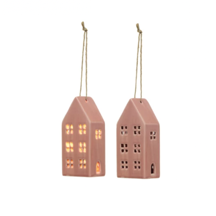 Bring some charm to your home with our Pink Hand-Painted Stoneware House! This unique piece comes with a built-in LED light for a cozy touch. Available in 4 styles, each one is lovingly hand-painted for a one-of-a-kind look. Add some personality to any room with this adorable decor.