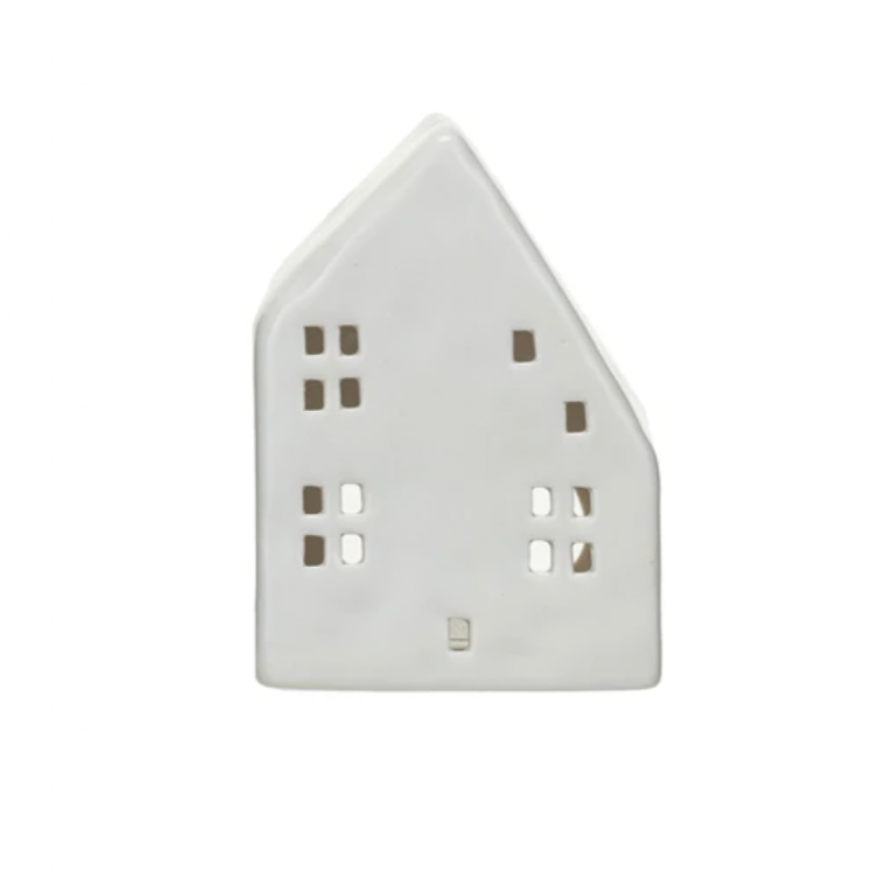 Illuminate your home with these quirky Stoneware House Tealight Holders, available in 2 fun and unique colors. Enjoy the warm, cozy glow of a tealight while adding a touch of whimsy to any room. A perfect addition to your home decor that is sure to bring a smile! Cream