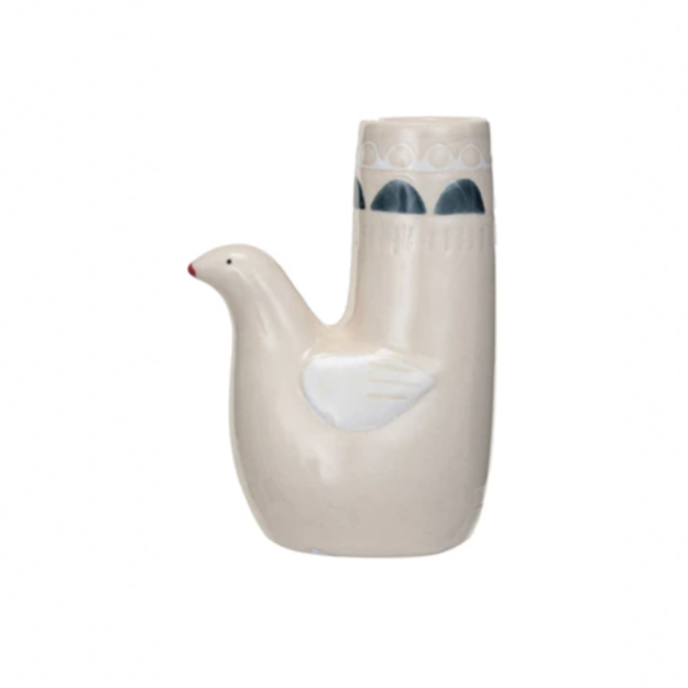 Add a touch of whimsy to your home decor with our Hand-Painted Dove Shaped Taper Holder. Each holder is uniquely hand-painted on stoneware, making it a one-of-a-kind piece. Perfect for adding a playful element to your candle display. White Wing