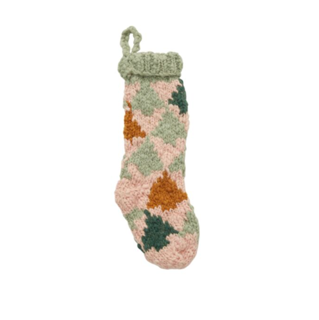 Introducing the Cottage Stocking in a charming tree design! Hang this cozy stocking on your mantel to add a whimsical touch to your holiday decor. This stocking is sure to bring festive cheer to your home and Santa will have no trouble finding it!