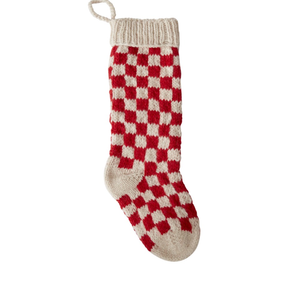 Unleash some festive fun with our Damier Stocking in Red Check! This playful stocking features a bold red check print, adding a touch of whimsy to your holiday decor. Bring a touch of quirkiness to your fireplace with this unique stocking.&nbsp;