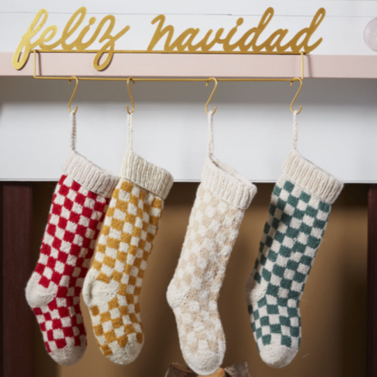 Unleash some festive fun with our Damier Stocking in Red Check! This playful stocking features a bold red check print, adding a touch of whimsy to your holiday decor. Bring a touch of quirkiness to your fireplace with this unique stocking.&nbsp;