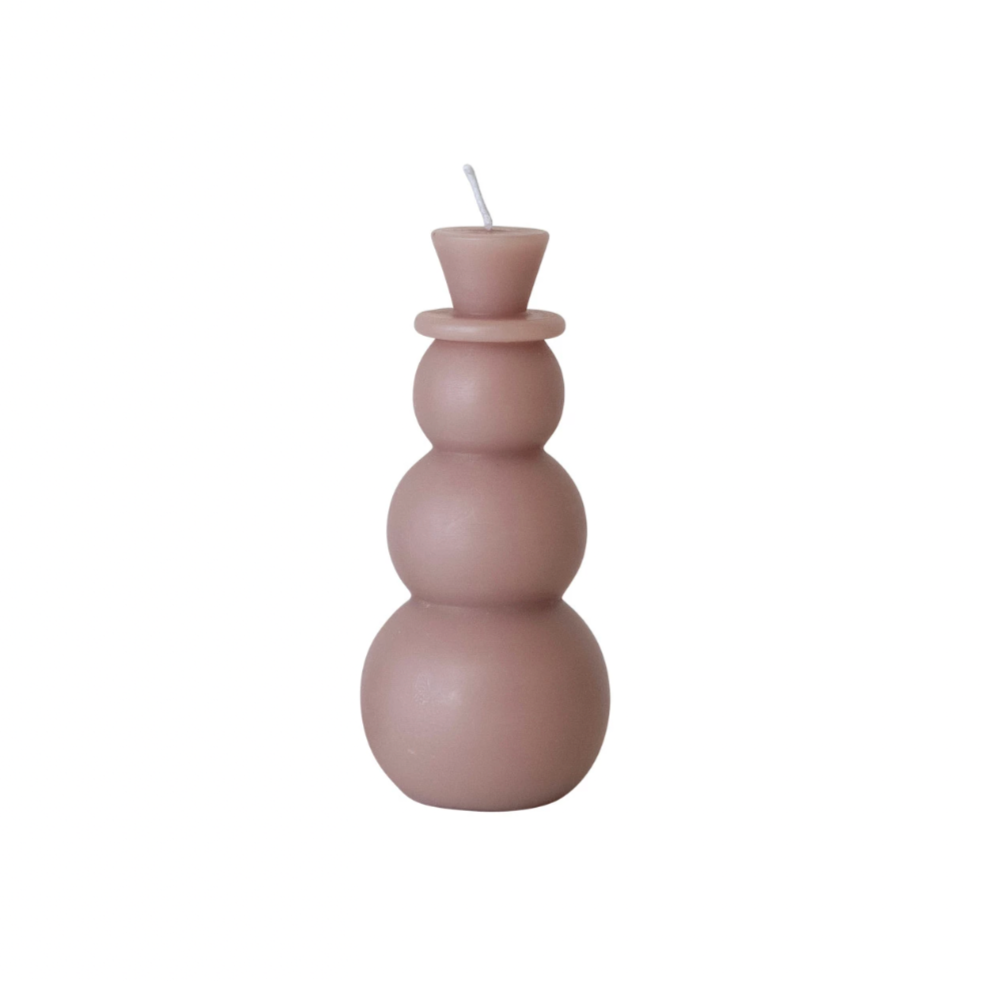 This snowman shaped candle is the perfect addition to your home decor. Made from unscented wax, it adds a touch of whimsy and coziness to any room. It's a unique and playful piece that will bring a smile to your face (unlike your real snowman).