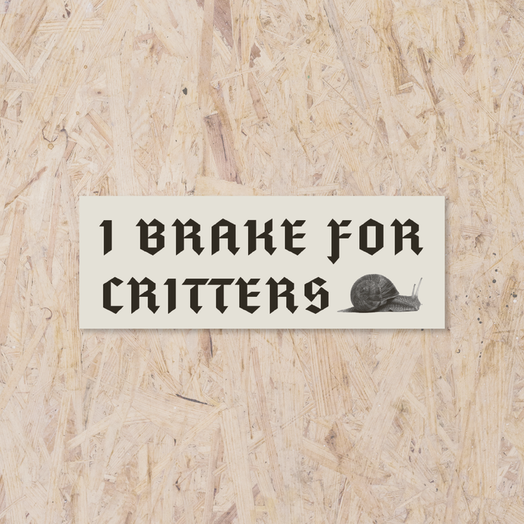 light gray rectangle sticker reading "I brake for critters" featuring a snail