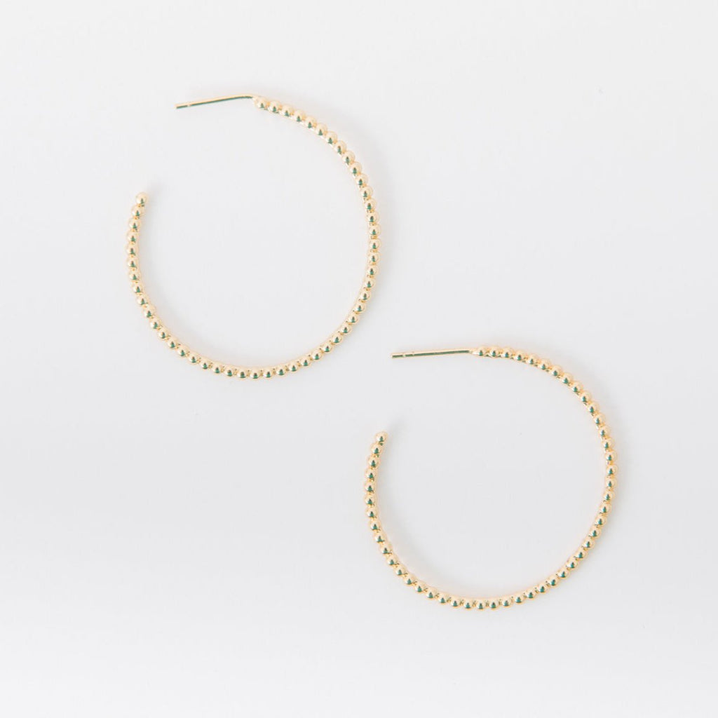 Extremely light weight  30 mm Available in gold 14k gold filled means this baby is meant to last!&nbsp; (Check out our&nbsp;jewelry care guide&nbsp;for how to make sure you get max wear on these!) Hypoallergenic Earrings are slightly malleable.&nbsp; You will be able to shape them into place and pull them a bit to get the look you want