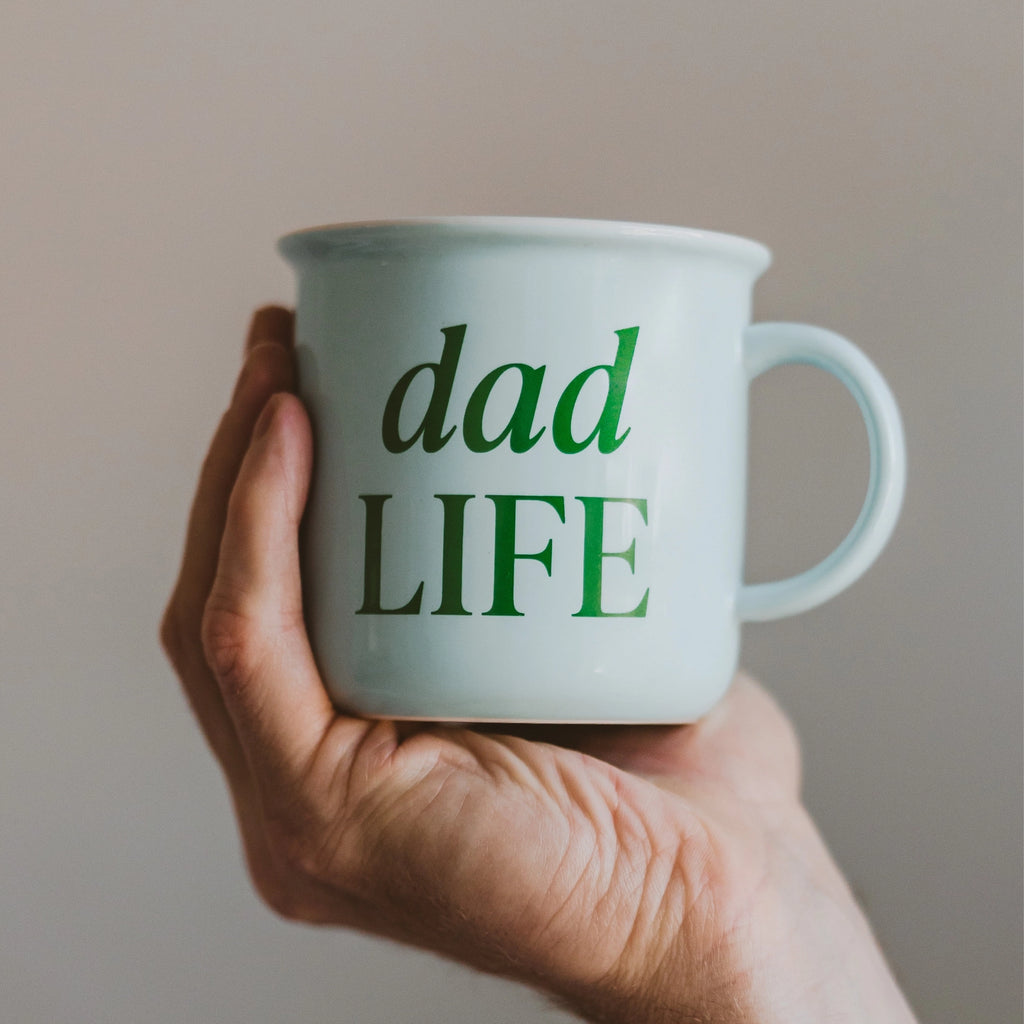 As the morning sun rises, it's time for Dad's daily coffee ritual. He reaches for his favorite light blue mug, a true symbol of dad life – those easygoing (and sometimes chaotic) mornings with the kids. The mug's simple "Dad Life" design perfectly encapsulates the essence of fatherhood, making it an ideal and heartfelt Father's Day gift.