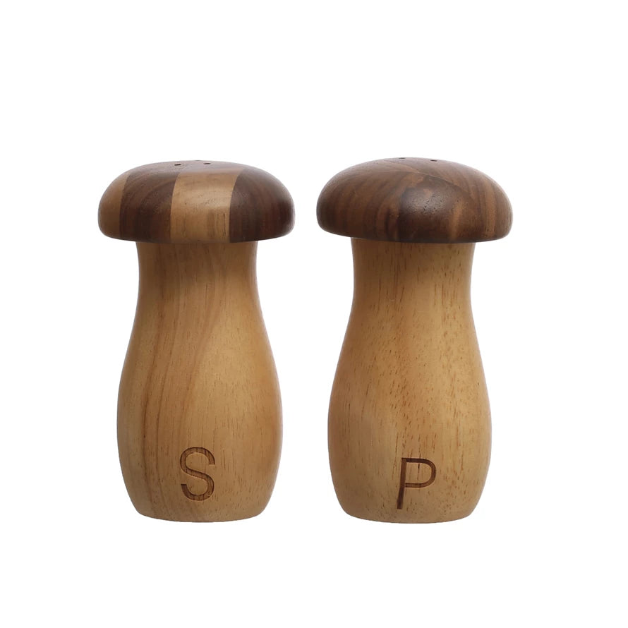 Spice up your dining experience with these unique Rubberwood &amp; Walnut Mushroom Shaped Salt &amp; Pepper Shakers. Made from durable rubberwood and classy walnut, these shakers will add both style and functionality to your table. Perfect for any food lover (fungi fun, anyone?), these shakers are a must-have for any kitchen.