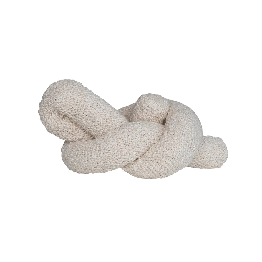 Add a playful touch to your home decor with our Woven Cotton Bouclé Knot Pillow. This unique pillow features a soft, textured bouclé design and a quirky knot detail. Perfect for adding a fun and cozy accent to any room. 22"L x 9"W x 7"H