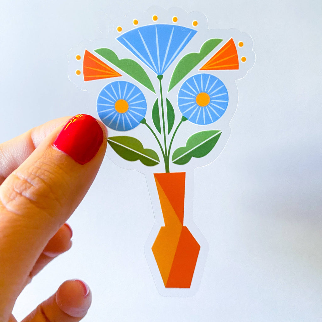 A vibrant, geometric floral vase sticker! This sticker has a clear background. 3 in x 2.5 in