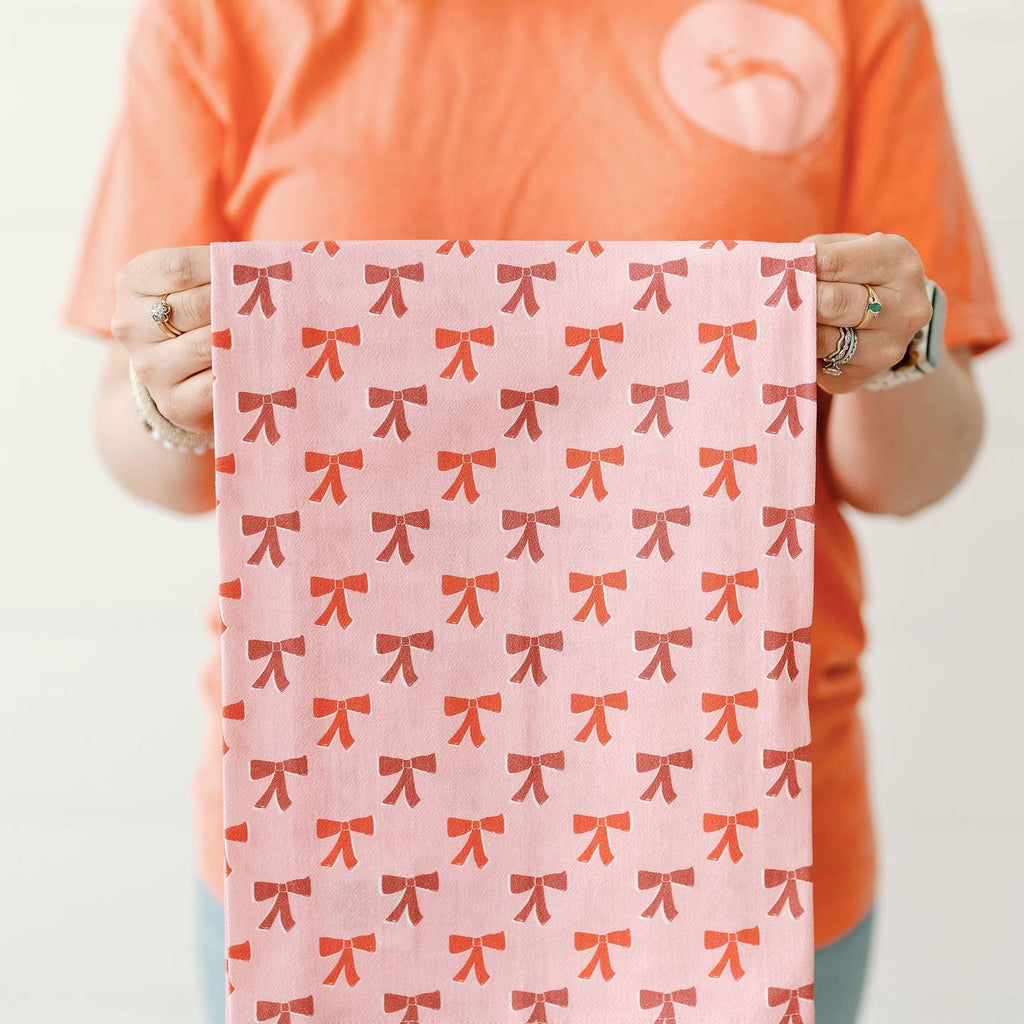 Spruce up your kitchen with our Red Bows Full Pattern Tea Towel! This unique, quirky tea towel features a playful design of red bows, adding a touch of fun to your daily routine. Made with high-quality materials, it is perfect for drying dishes or adding a pop of color to your home decor.