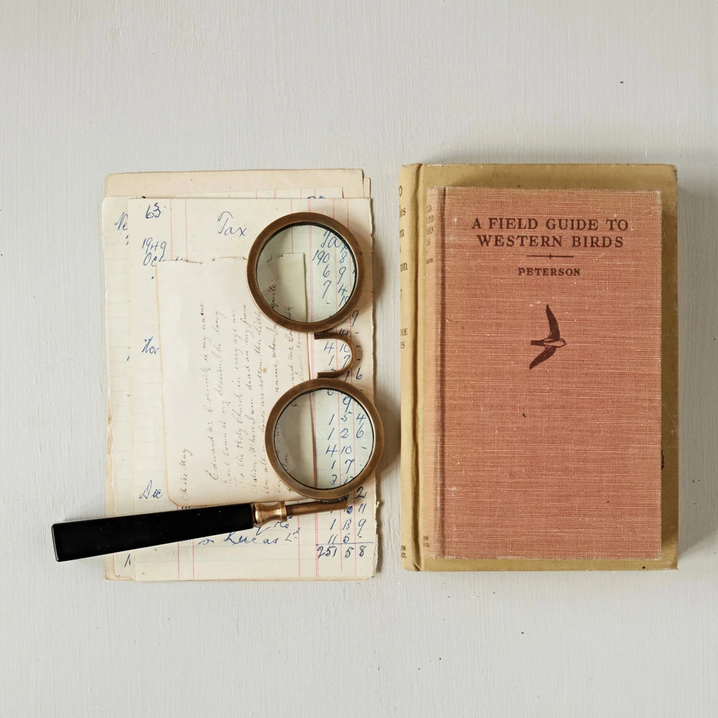 Magnifying glasses can be so much fun. Here is a pair of antique magnifying spectacles. They are perfect for decor on a bookshelf or desk. For the person with vision difficulties, these beauties will be handy to grab when needing to see small items or writing. 6-1/4"L x 7"H Brass