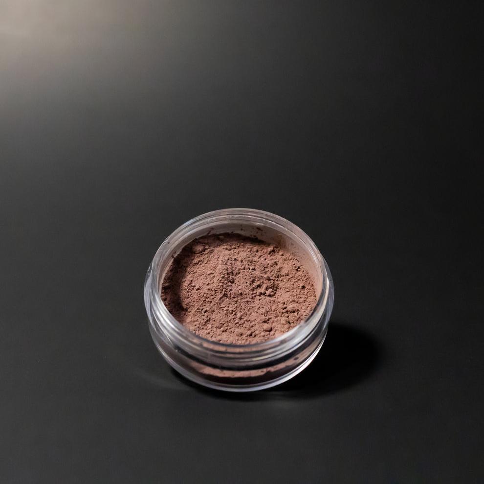 loose eyeshadow puck, desert plum color