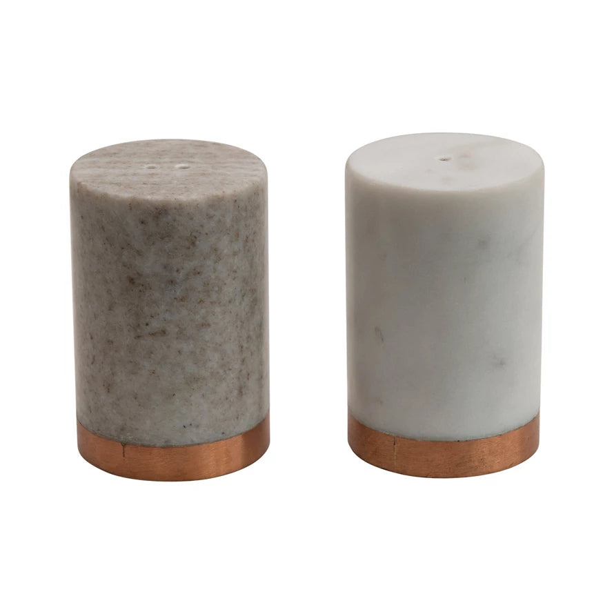 These marble salt and pepper shakers are perfect for any kind of home. If you are wanting to get rid of the normal salt and pepper shakers and are wanting to replace it with something cute that adds style, this is for you. This item looks great at dinner parties and just sitting on top of countertops while not in use. Its beautiful copper base compliments the white and beige color perfectly.