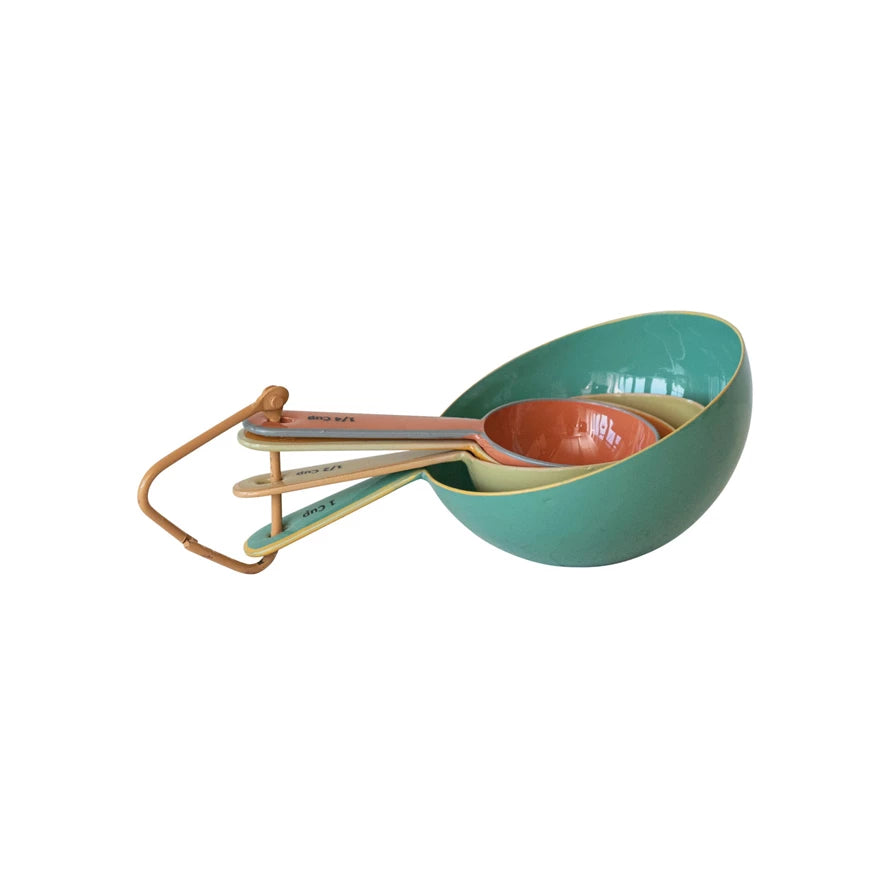 Get precise measurements with a pop of color! These enameled stainless steel measuring cups come in your choice of 4 fun hues. Durable and easy to clean 