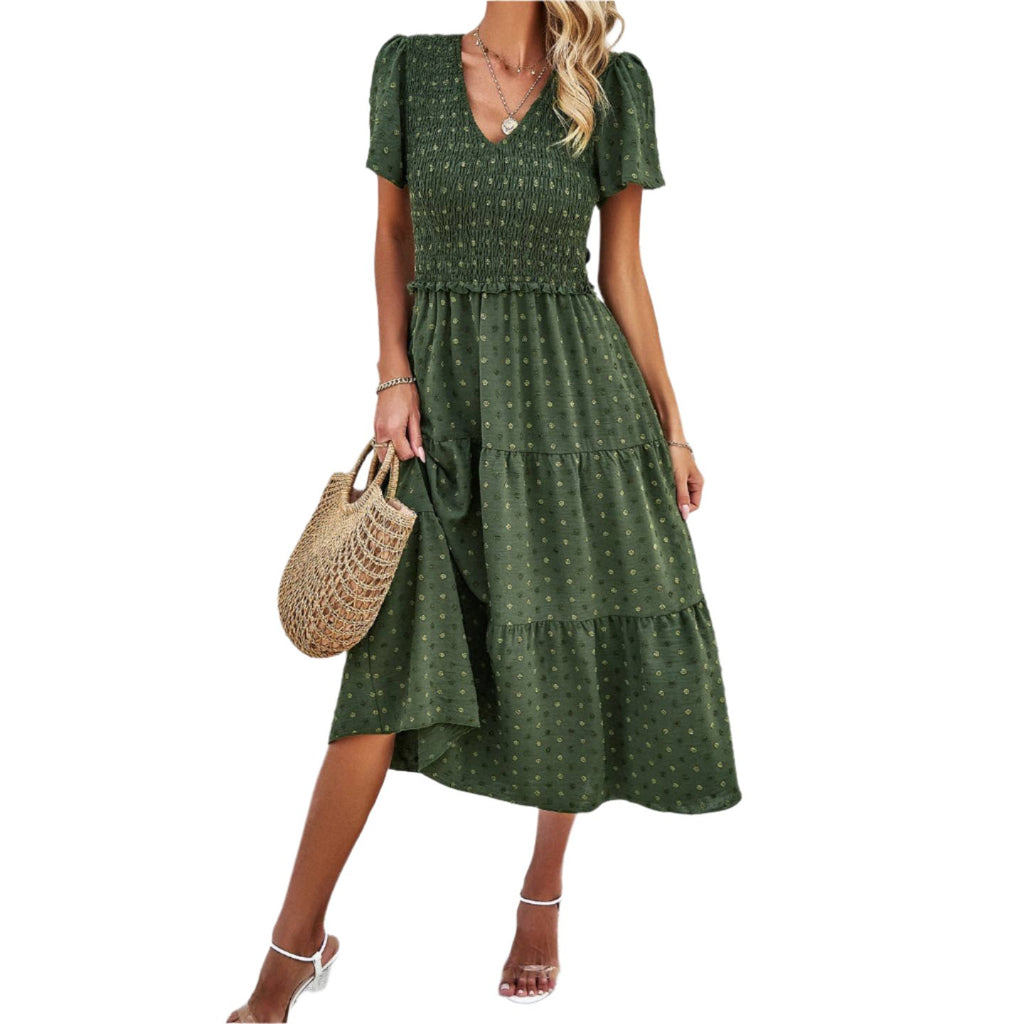 Get ready to turn heads in this Smocked V Neck Midi Dress in a gorgeous shade of green. The V neck and smocked details add a touch of playfulness to this classic silhouette. Perfect for any event, this dress will have you feeling confident and stylish.