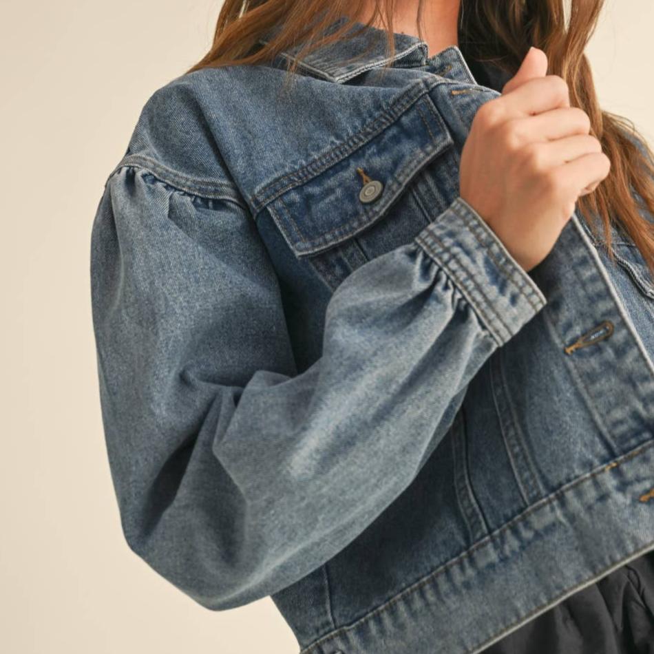 Add some serious style to your wardrobe with our Long Sleeve Puff Sleeve Denim Jacket. This jacket features long, puffed sleeves that will make a statement wherever you go. Pair it with any outfit for an effortlessly cool look. Trust us, you won't regret it!