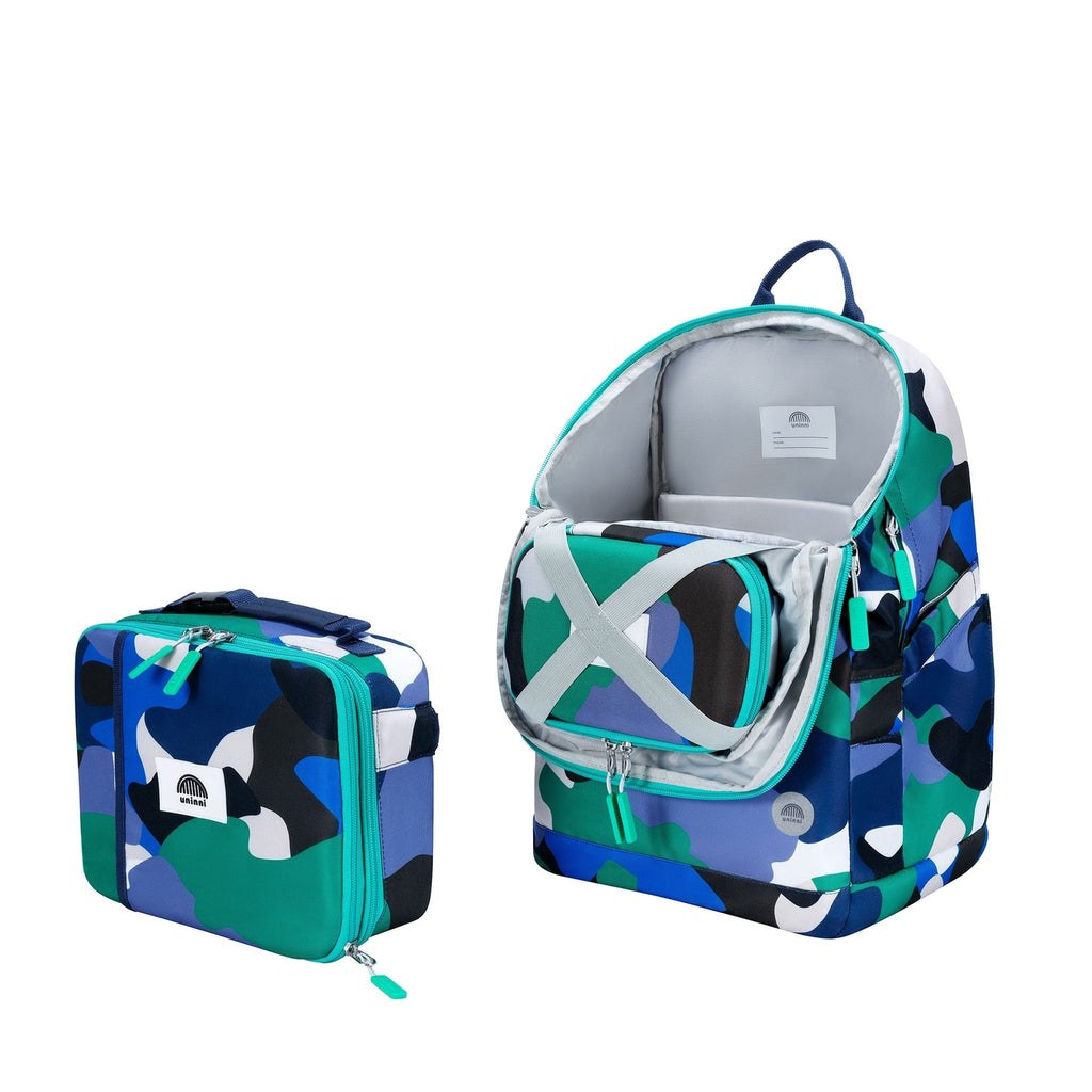 Keep your writing tools organized and stylish with the Arden Pencil Case in Camo Kid Blue/Green design. This quirky and playful case adds a touch of fun while holding all your pencils, pens, and markers in place. Say goodbye to chaotic desks and hello to a minty fresh workspace.