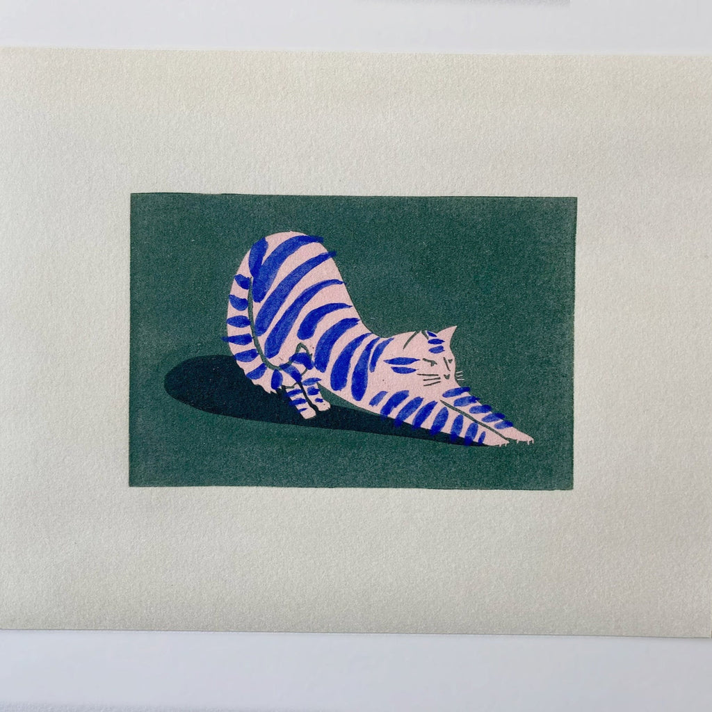 8X10 inch print with a green background and a pink cat with blue stripes stretching