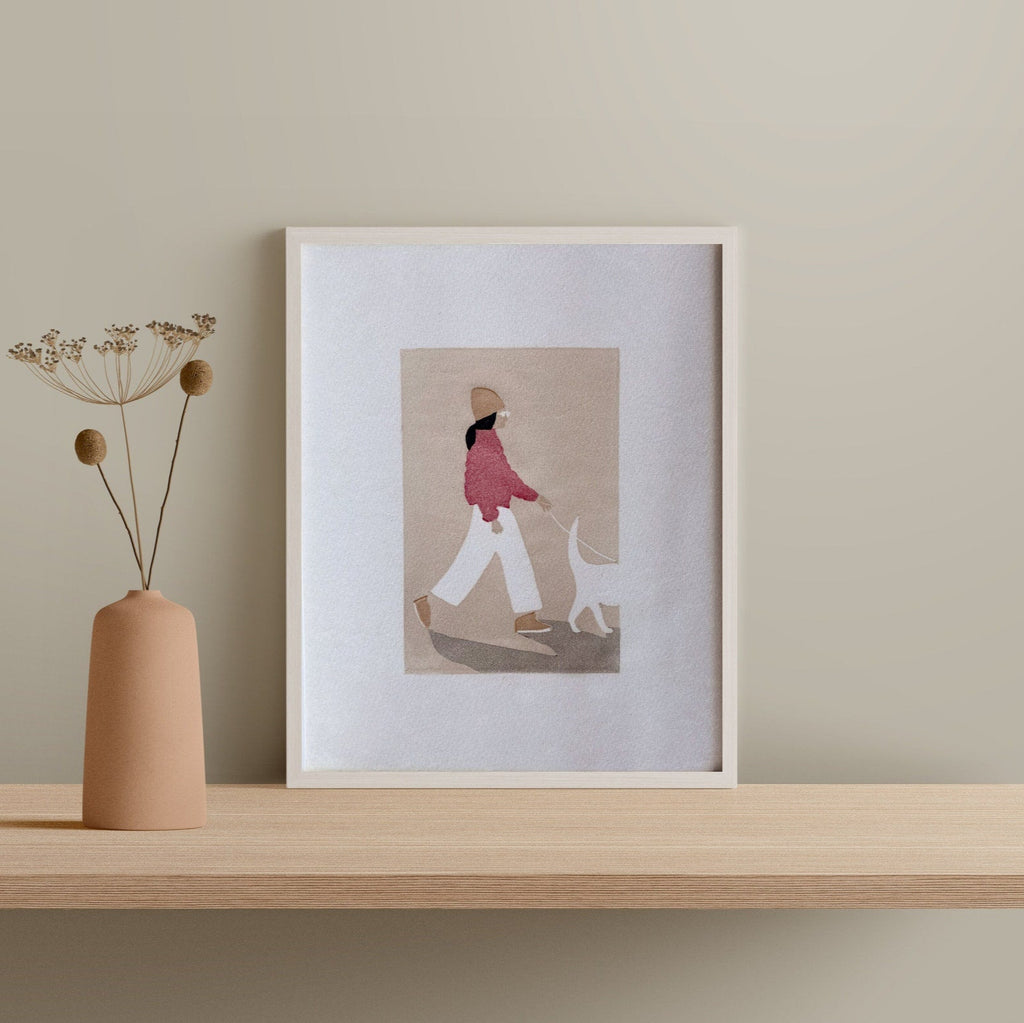 8X10 inch print of a women in a red coat walking a white dog