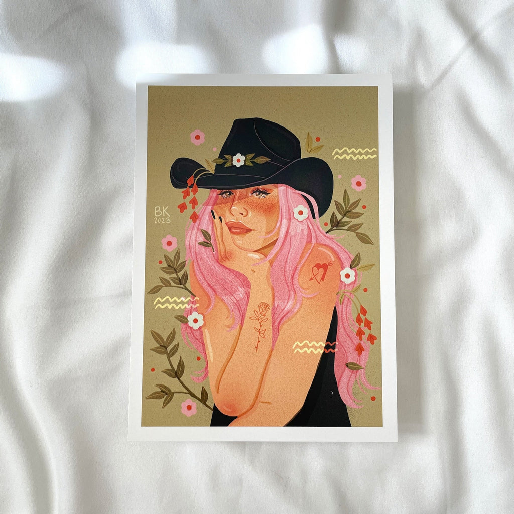 Cutie Cowgirl art print by Brittany Keller, printed on silk cover paper (weight 111#) with a semi-glossy finish.