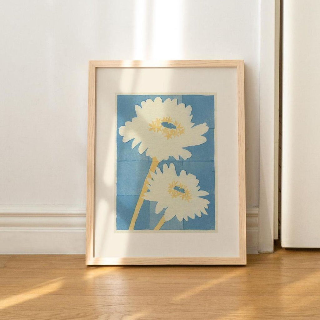 8X10 inch print with a blue background and two big white flowers with yellow details