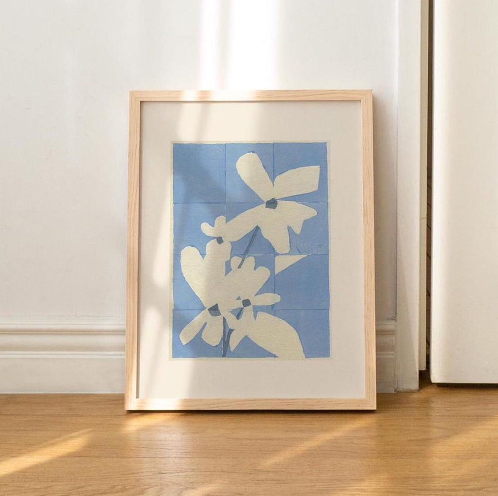 8X10 inch print with a blue background and big white flowers with hints of navy