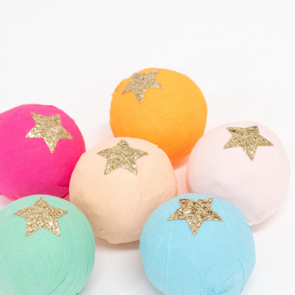 Everyone loves a good surprise - and our Surprise Party Balls will really delight your party guests! They are crafted from crepe paper, and are filled with wonderful treats. They are perfect to place next to party table settings, or to pop into party bags.