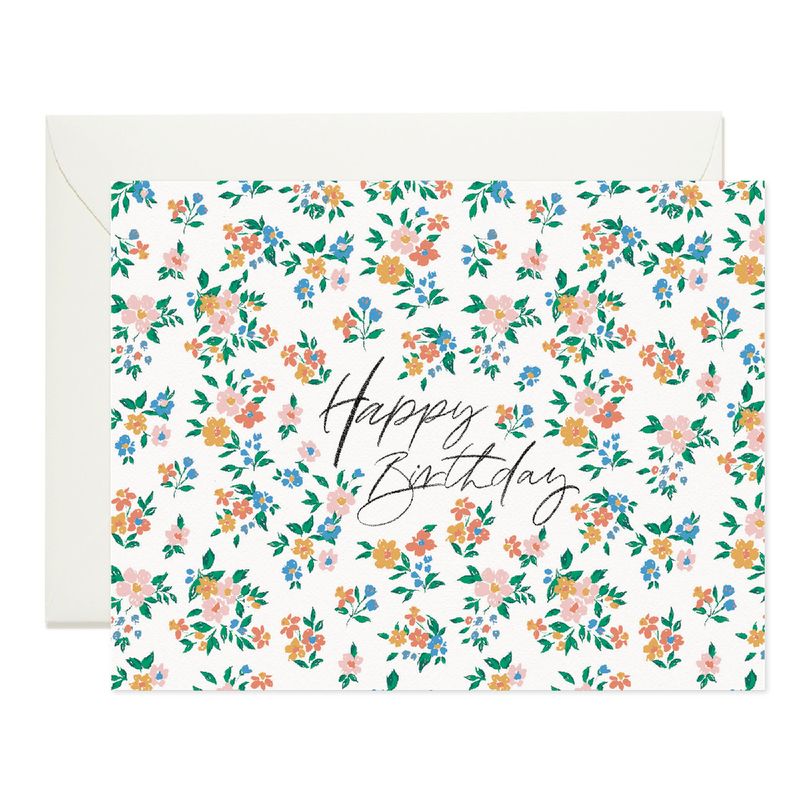 white card with colorful florals reading "happy birthday"