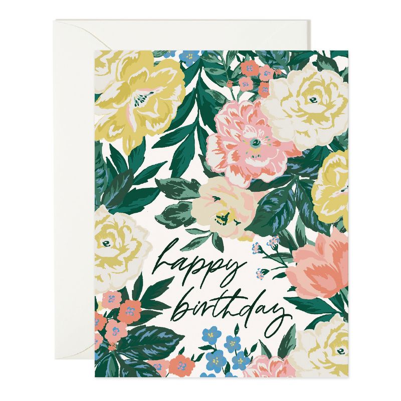 white card reading "happy birthday" covered in pink and yellow spring florals