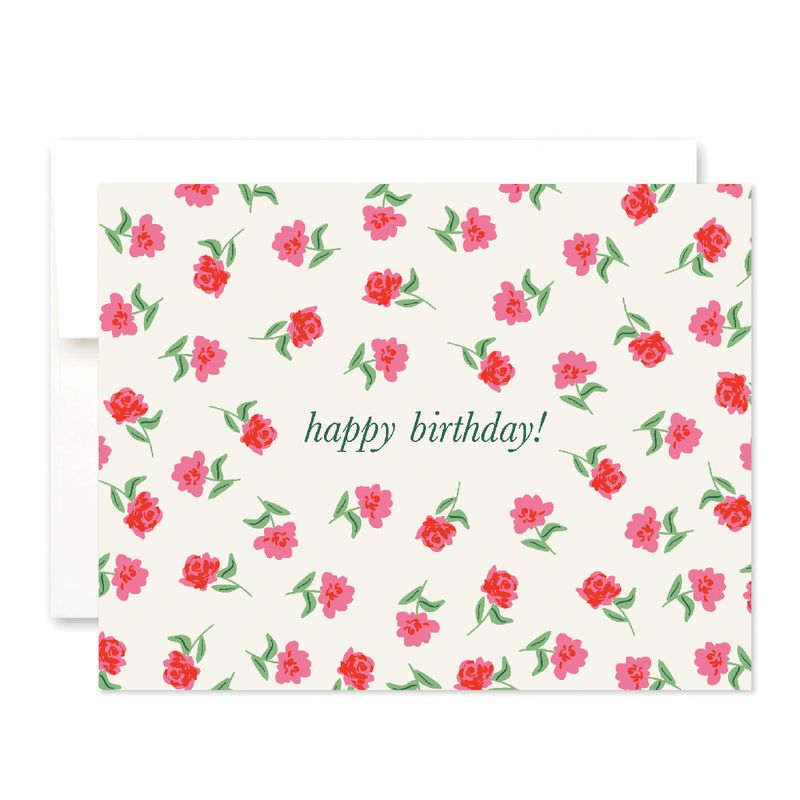 white card covered in roses, reading "happy birthday!"