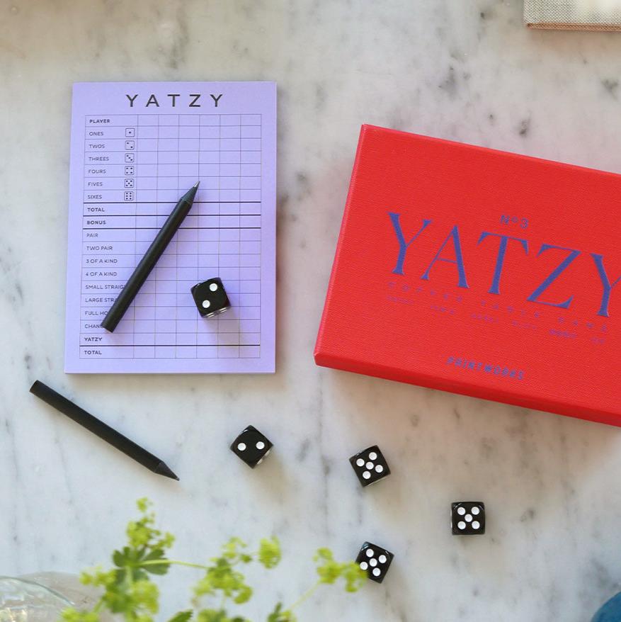 Discover a modern twist to your beloved game, Yatzy, where aesthetics meet entertainment. Our Yatzy Classic includes five black dice, two black pencils, and a 50-page scorecard. It has easy-to-read English, French, and German instructions and is suitable for up to 6 players, ages 4+