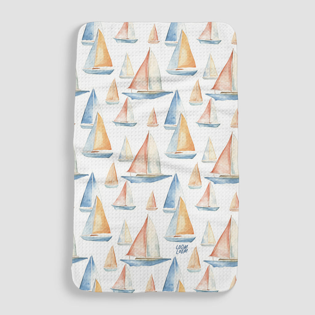 white tea towel with watercolor sailboats