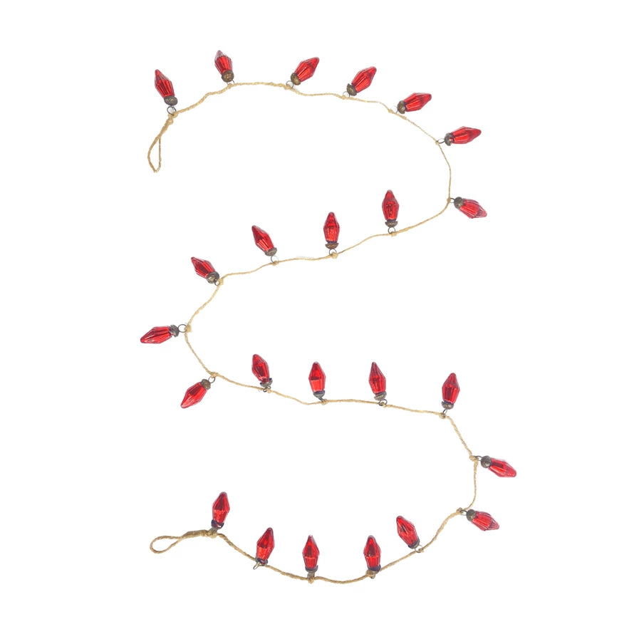 This mercury glass ornament garland on jute string is a beautiful way to infuse the space with holiday cheer. The rich red color of the mercury glass brings a warm, traditional feel to any setting, while the jute string adds a hint of rustic charm