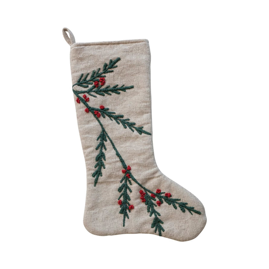 Add a touch of classic holiday charm to the festive decorations with our plaid cotton blend stocking, which truly embodies the spirit of Christmas. Any holiday decorative display benefits from the warm cream base of the stocking and the traditional green and red plaid pattern because they beautifully contrast with one another. Its woven cotton-polyester fabric ensures durability, while the timeless design complements any Christmas theme. Whether filled with treats or displayed as part of the decor, this sto