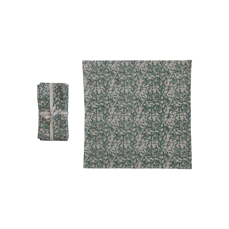 Add some charm and sophistication to the dining experience with these botanicals and gold foil napkins. This set of four square napkins features a beautiful botanical pattern in natural and green colors, enhanced by gold foil details that sparkle in the light. These napkins are made of cotton and linen, a blend that offers both softness and durability. They are also reusable and machine-washable, making them a practical choice.