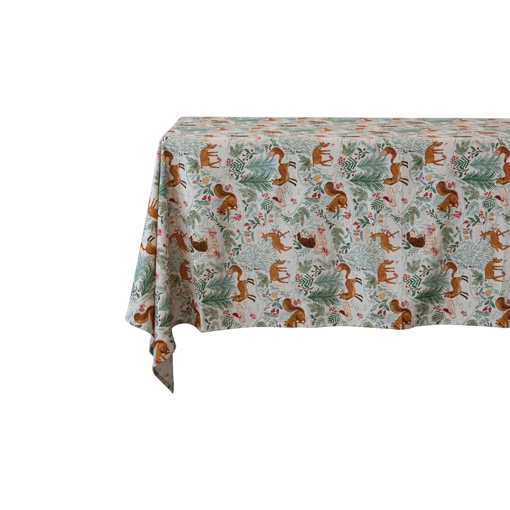 Add some beauty and whimsy to the dining table with this cotton-printed tablecloth with a woodland flora and fauna pattern. This tablecloth is a stunning and unique piece that features various animals, plants, and flowers in multicolor, creating a woodland flora and fauna pattern that is both charming and captivating. The tablecloth can transform any dining table into a magical forest scene, bringing some nature and wonder to any space