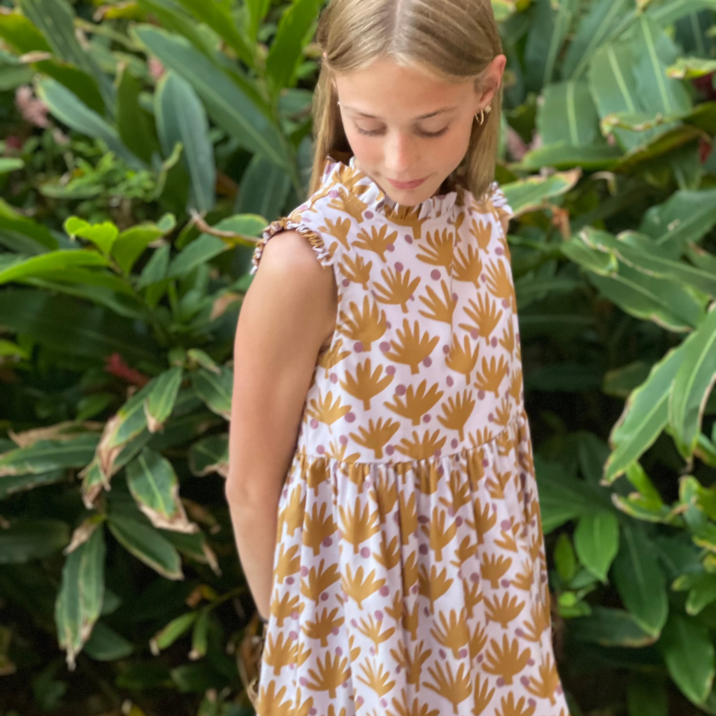 Find me in Ibiza dress is perfect for your kid's wardrobe. Featuring cute ruffle sleeves and made from 100% cotton fabric, this dress provides comfort and durability. With a high-quality construction and attention to detail, you can rest assured that your child will look and feel amazing.