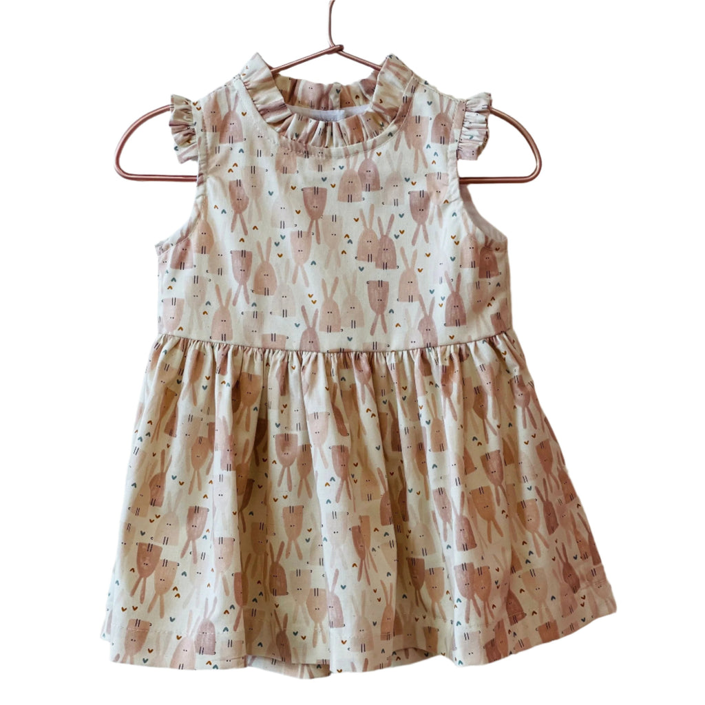 The Lily dress is perfect for your kid's wardrobe. Featuring cute ruffle sleeves and made from 100% cotton fabric, this dress provides comfort and durability. With a high-quality construction and attention to detail, you can rest assured that your child will look and feel amazing.